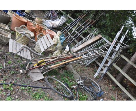 AN ALUMINIUM EXTENSION LADDER length 350cm, a step ladder, a folding metal chair and a selection of garden tools