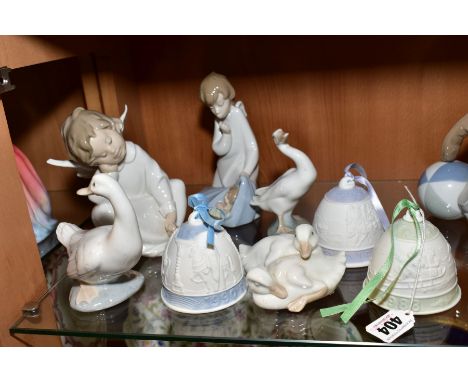 SIX LLADRO PORCELAIN FIGURES AND CHRISTMAS BELLS AND TWO NAO DUCK FIGURES, including bells dated 1988, 1990 and 1993 and two 