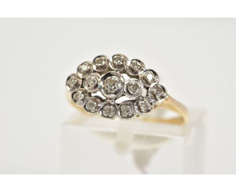 A 9CT GOLD DIAMOND CLUSTER RING, designed as an openwork lozenge shape set with fifteen single cut diamonds, plain polished b