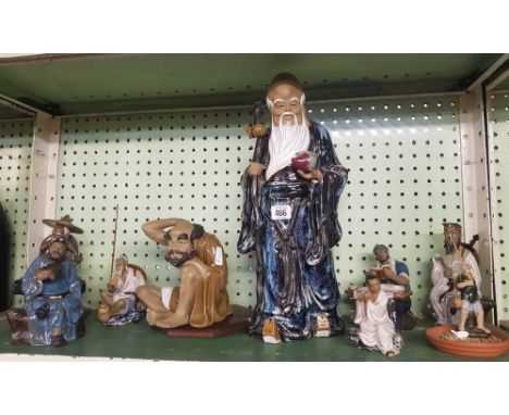 SHELF OF ORIENTAL FIGURES 