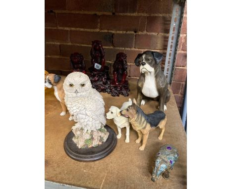 SHELF OF ANIMAL ORNAMENTS