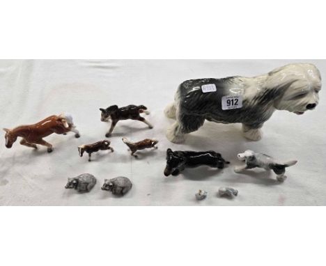 SHELF OF MISC CHINA ANIMAL FIGURES, HORSES, OLD ENGLISH SHEEP DOG & A DAXON