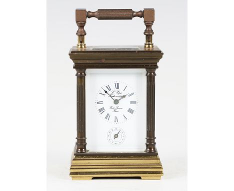 A late 20th century French brass cased diminutive carriage alarm clock by L'Epee, the eight day movement with platform escape