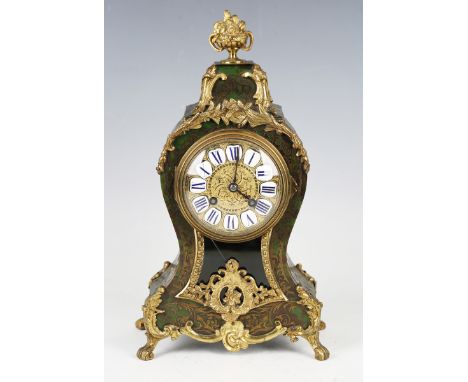 A late 19th century French gilt metal mounted and green stained tortoiseshell boulle cased mantel clock with eight day moveme