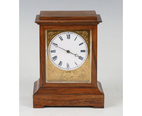 A late 19th century French rosewood mantel timepiece with single train movement, the circular dial with Roman hour numerals w