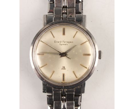 A Girard-Perregaux Gyromatic stainless steel cased gentleman's bracelet wristwatch, the signed silvered circular dial with gi