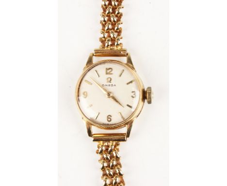 An Omega gold circular cased lady's wristwatch, circa 1960, the signed jewelled movement detailed 'Omega Watch Co Swiss 17286