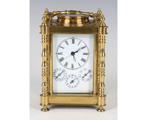 A 20th century Chinese brass carriage calendar alarm clock, the eight day movement striking and repeating on a bell, the enam