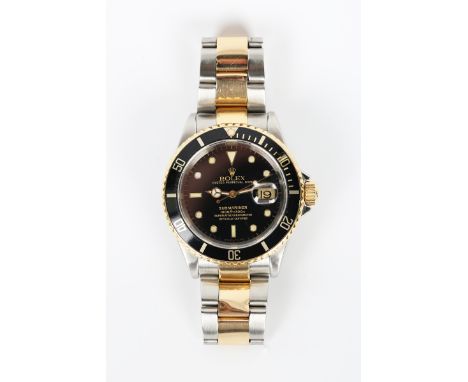 A Rolex Oyster Perpetual Date Submariner stainless steel and yellow gold gentleman's bracelet wristwatch, Ref. 16613, circa 2