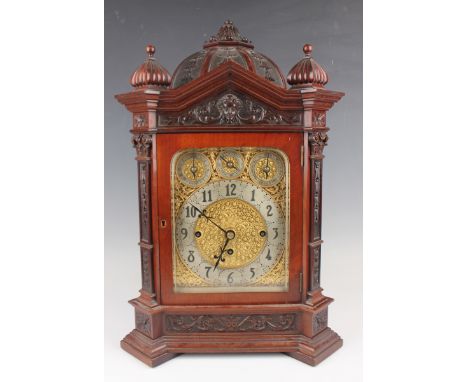 An impressive late Victorian mahogany bracket clock with eight day triple fusee movement chiming quarters on eight bells or f