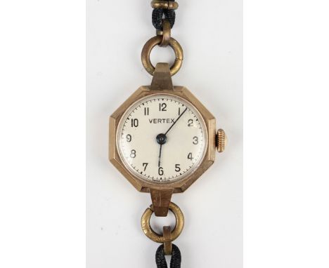 A Vertex 9ct gold octagonal cased lady's wristwatch, the signed silvered dial with black Arabic numerals and blued steel hand