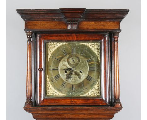 A George III Lancastrian oak longcase clock with mahogany and inlaid decoration, the eight day movement striking on a bell, t