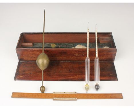 A George III brass hydrometer with four weights and boxwood slide rule, by Robert Atkins of 136 Fenchurch Street, London, tog