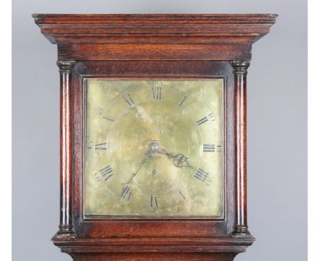 A George III oak longcase clock with thirty hour movement striking on a bell via an outside countwheel, the 11-inch square br