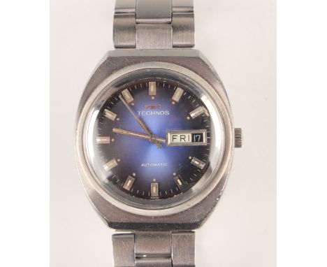 A Technos Automatic stainless steel cased gentleman's bracelet wristwatch, the signed blue circular dial with silvered baton 