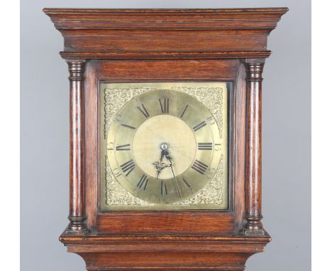 A George III oak longcase clock with thirty hour movement striking on a bell via an outside countwheel, the 11-inch square br