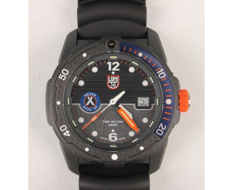 A Luminox Bear Grylls Never Give Up Carbonox cased diver's wristwatch with quartz movement, the signed two tone grey dial wit