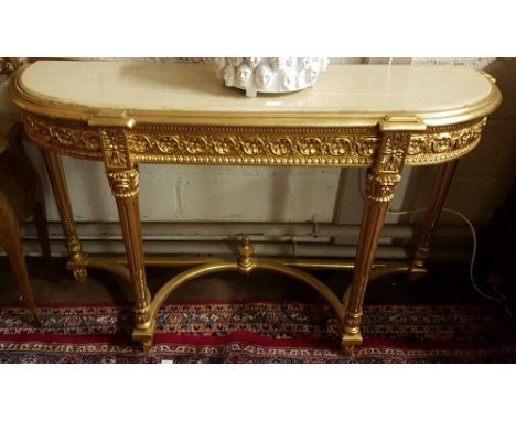 Gilt Console Table, with a bowfront beige marble top, two turned and reeded legs to the front, with a curved stretcher, 55"w 