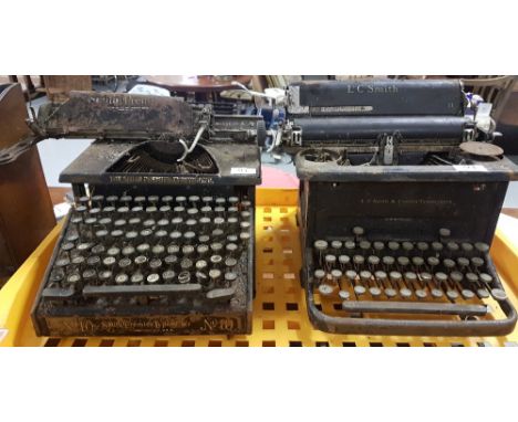 2 manual typewriters - SMITH PREMIER TYPEWRITER, no 10, USA, model 10-A and L C SMITH & CORONA typewriter, no 11, both for re