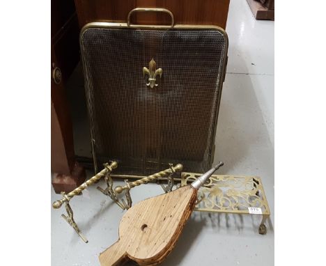 Pair of brass fire dogs, a rope design brass trivet, rustic fire bellows, 5 fire irons & a folding brass firescreen (10)