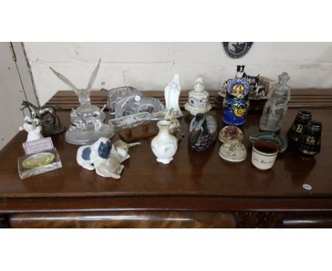 Shelf of ornaments, including Swedish glass wild animals, birds, horse figures, NAO dogs etc