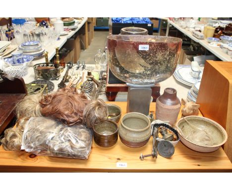 Various items of Studio pottery, a carved wood pig ornament, wigs, a brass door knocker etc.