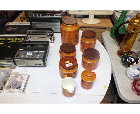 A quantity of Hornsea pottery including graduated storage jars, preserve jar and cream jug