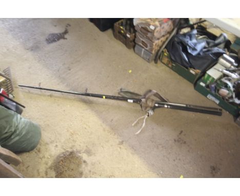 A Shakespeare Black Mirage Specemen two piece fishing rod with cloth bag 