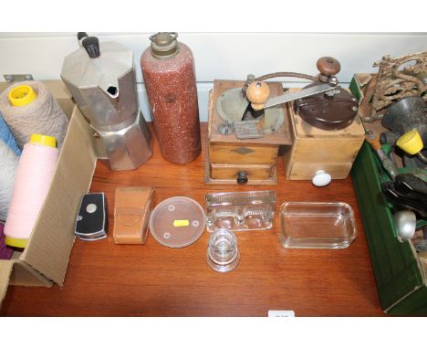 A collection of various vintage kitchenalia to include coffee grinders, mincers, potato ricer, waffle iron, bean slicer etc.