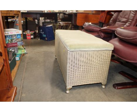 A loom upholstered ottoman