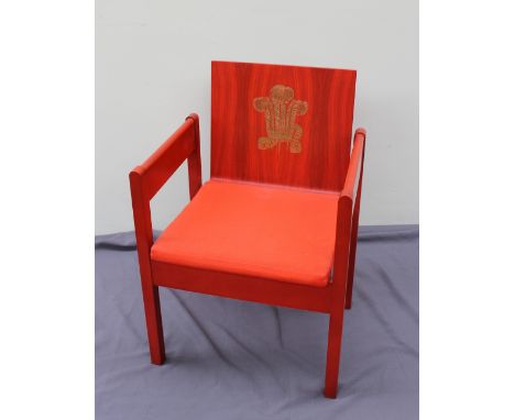 The Earl of Snowden and Carl Toms a red painted beech and laminate elbow chair produced for the Investiture of the Prince of 