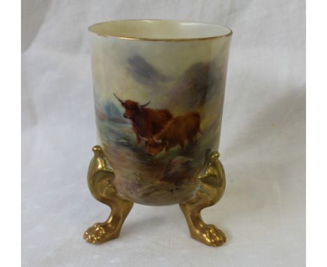 A Royal Worcester porcelain vase, of cylindrical form on three gilt legs, painted with Highland cattle, signed H Stinton, puc
