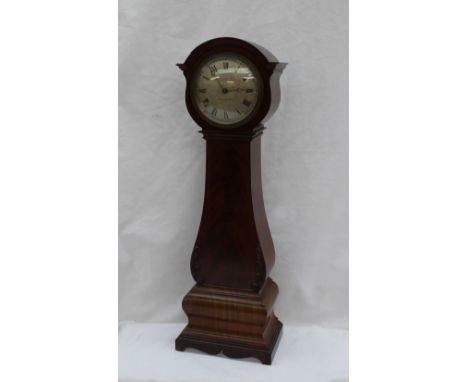 A 19th century mahogany miniature longcase clock, the circular silvered dial with Roman numerals inscribed "Finigans Ltd, Man