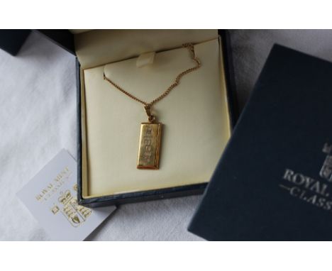 A Royal Mint 1/4 oz 2004 9ct gold ingot, No.0972/5000, on a 9ct gold chain, approximately 11 grams cased