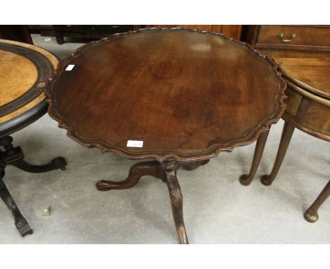 Mahogany piecrust tripod with paw feet