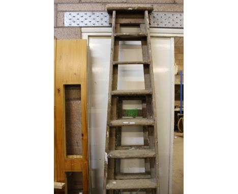 2 wooden step ladders