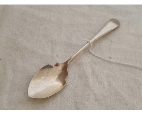 A SILVER PRESERVE SPOON, SHEFFIELD BY EV
