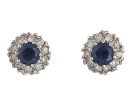 A PAIR OF SAPPHIRE AND DIAMOND CLUSTER EARRINGSEach central circular-cut sapphire, within a round brilliant-cut diamond surro