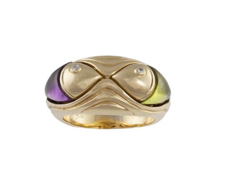 AN AMETHYST AND PERIDOT NATURALIA FISH RING, BY BULGARIOf fish design, set with a cabochon amethyst and peridot, the eyes set