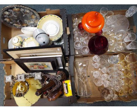 Four boxes containing a mixed lot to include glassware comprising drinking glasses,  decanters, vases and similar also some c