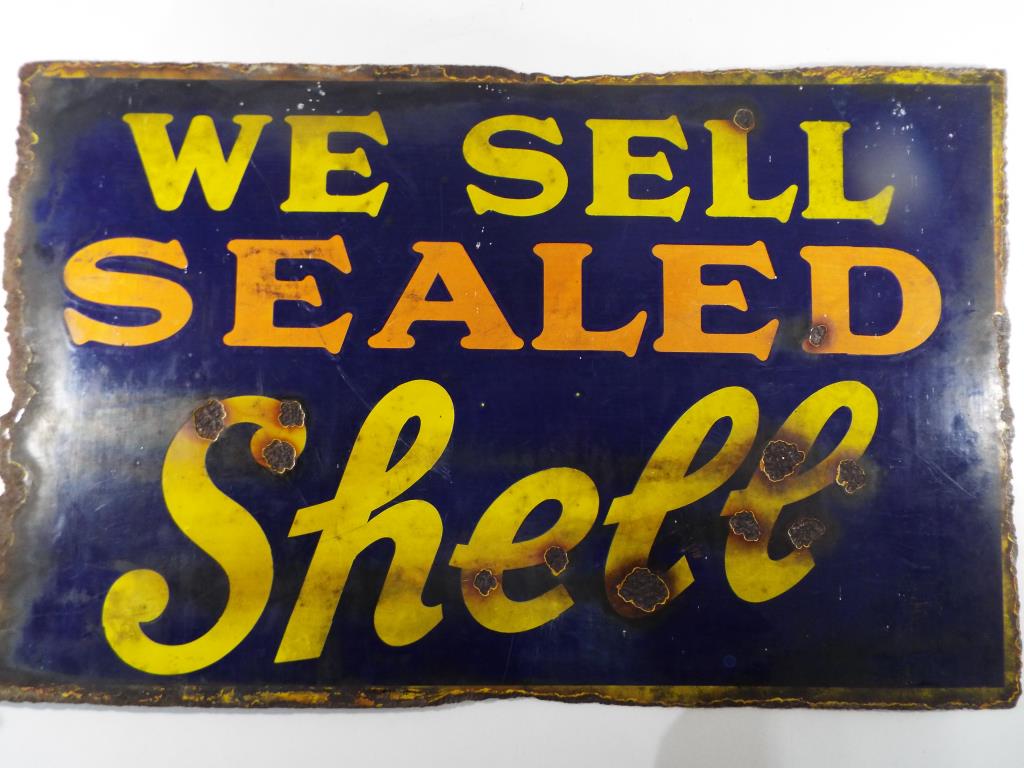 An original enamel sign marked to both sides 'We Sell Sealed Shell', 38