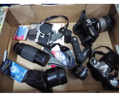 Cameras - a good lot to include two vintage Pentax MZ-10's, a quantity of lenses and other accessories - This lot MUST be pai