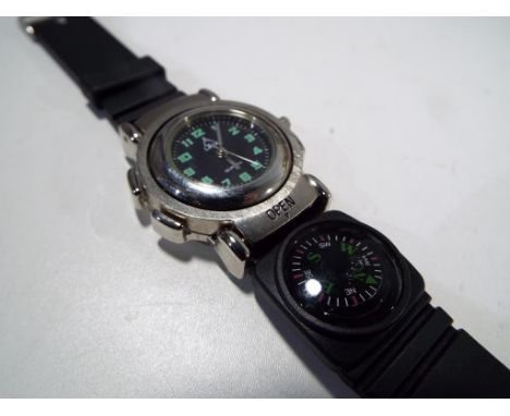 An unusual military styled contemporary wristwatch in a polished wooden presentation box, the  watch dial marked Lava and abl