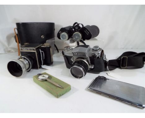 Two vintage cameras comprising Miranda Automex III, Reflex - Korelle and a pair of Skybolt binoculars 10 x 50 in leather case