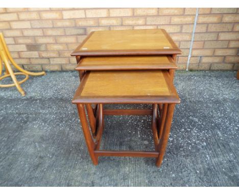 A good quality vintage G-Plan nest of three graduating teak tables largest approx 51cm x 50cm x 50cm Est £30 - £50 - This lot
