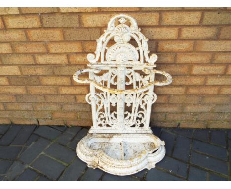 A Victorian cast iron stick stand, approximately 83 cm x 62 cm x 33 cm - This lot MUST be paid for and collected, or delivery