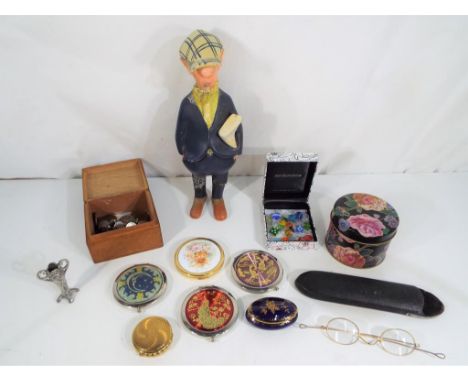 A good lot to include five powder compacts, a quantity of vintage coins, a pair of vintage spectacles in case, glass sweets, 