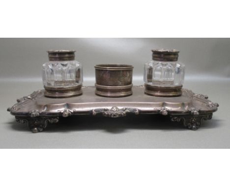 WILLIAM IV SILVER PRESENTATION INK STAND OF SHAPED OBLONG FORM WITH A SCALLOP AND FOLIATE DECORATED RIM, INSCRIPTION AND DATE