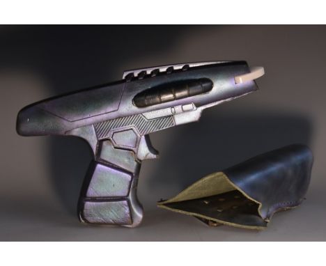 Props - Star Trek Enterprise - a moulded rubber phaser weapon, for use by Scott Macdonald in his role as Xindi-Reptilian Comm