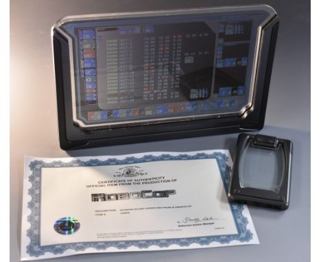 Movie Props - Robocop - a screen used Phone and Omnipad, made for use by actor Michael Keaton in his role as Raymond Sellars,